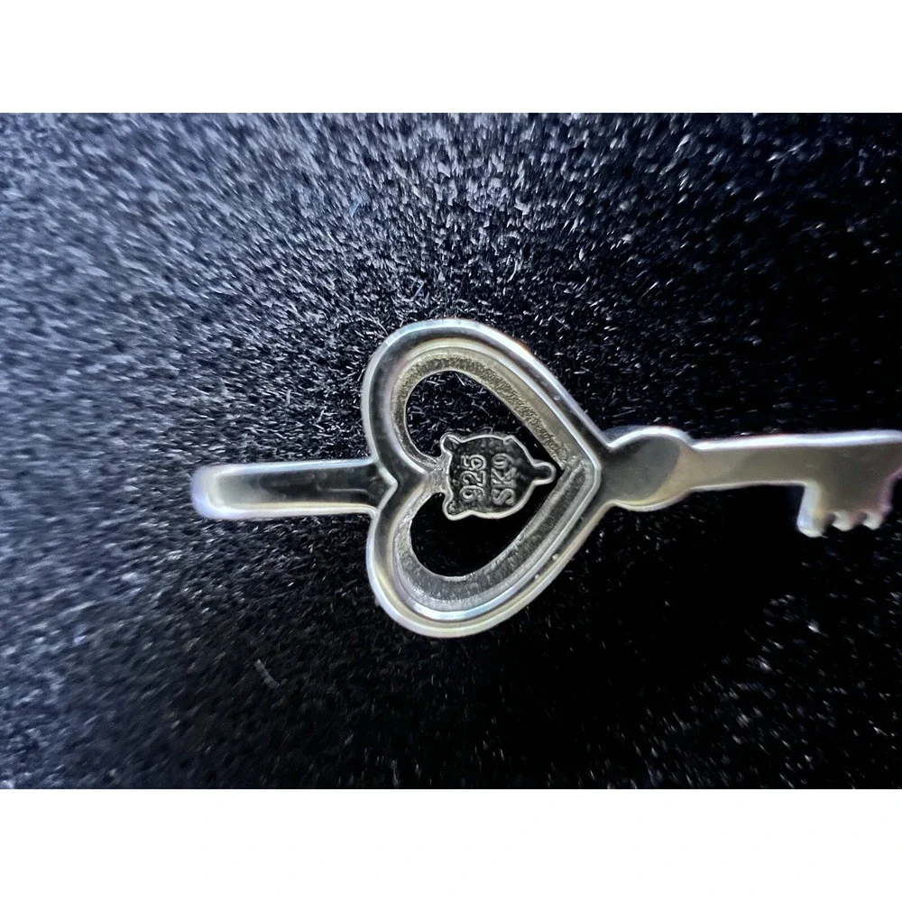 NEW KEY PENDENT WITH NATURAL DIAMOND.‎ 1